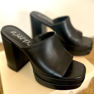 Wild pair black blocked heel platform sandal- worn once.